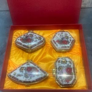 4 pc set gold tone trim with floral design pill/trinket boxes with original box
